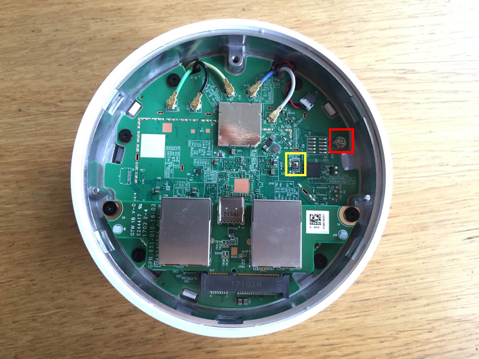 Google WiFi Gale PCB. Yellow box: SW7 recovery switch. Red box: WP screw with conductive washer next to the H1 chip.
